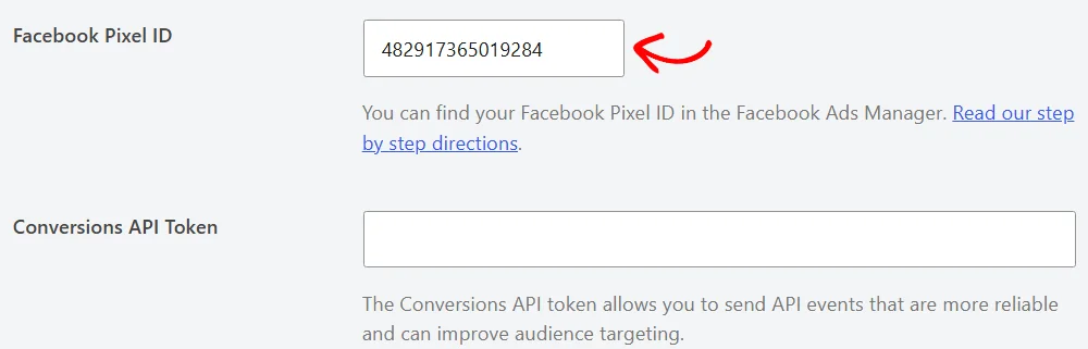 An arrow pointing at the Facebook Pixel ID field, filled in with a pixel ID