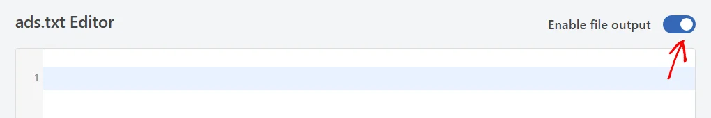 An arrow pointing at the Enable file output toggle, switched on beside the ads.txt Editor heading