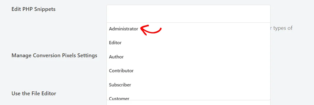 The Edit PHP Snippets role field open in the network Access Control tab, with an arrow pointing at Administrator