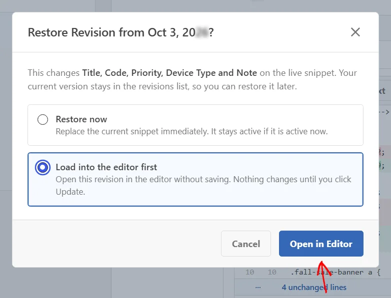 The Restore Revision overlay with Load into the editor first selected and an arrow pointing at the Open in Editor button