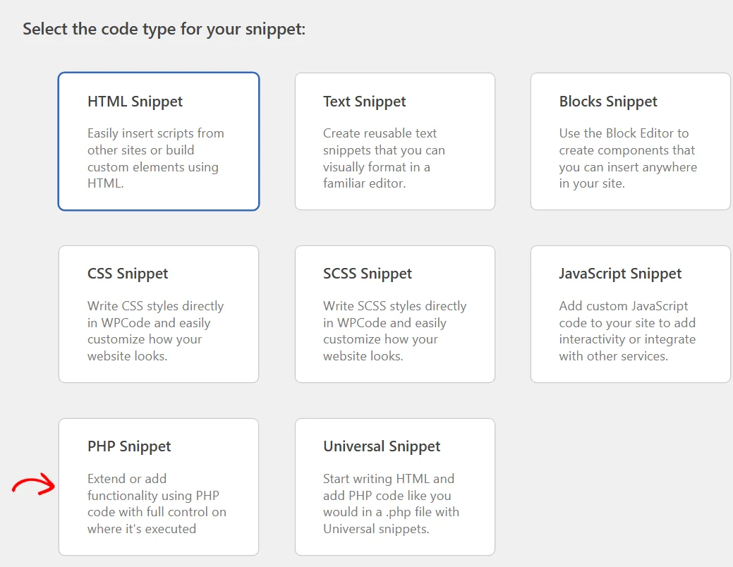 The WPCode code type picker showing eight snippet types with an arrow pointing at PHP Snippet
