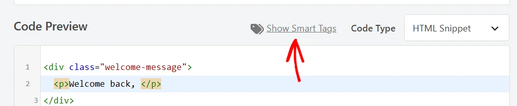 An arrow pointing at the Show Smart Tags button above the Code Preview editor